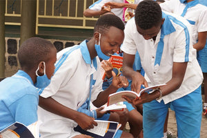 Children reading their new books