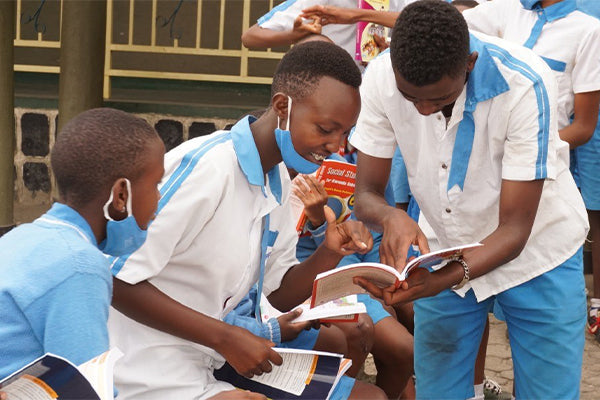 Children reading their new books