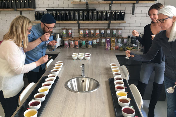 people participating in the teapigs tea-tasting training tasting teas